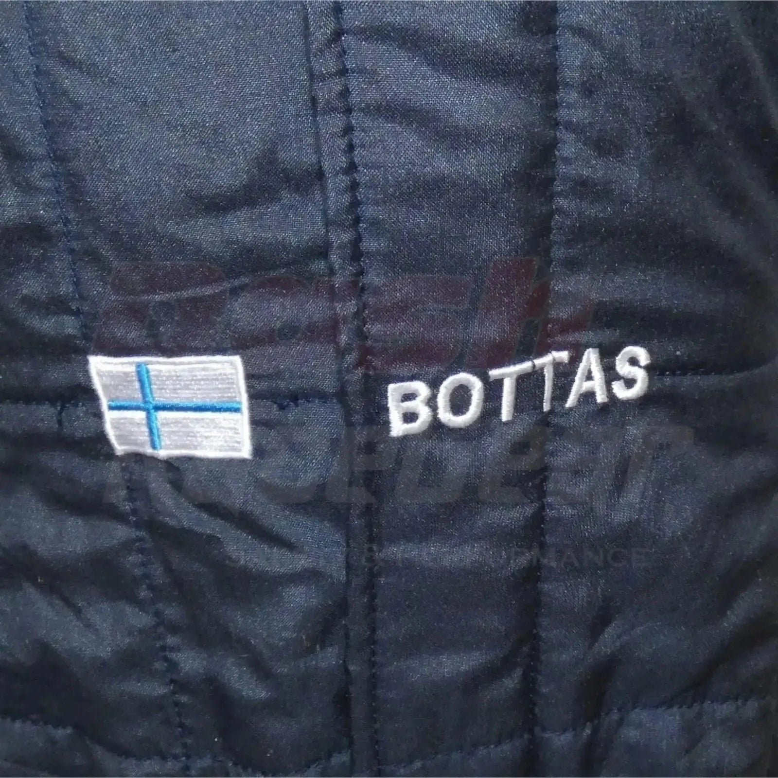 2013_Valtteri_Bottas_Williams_race_suit_Brazilian_GP-003.jpg