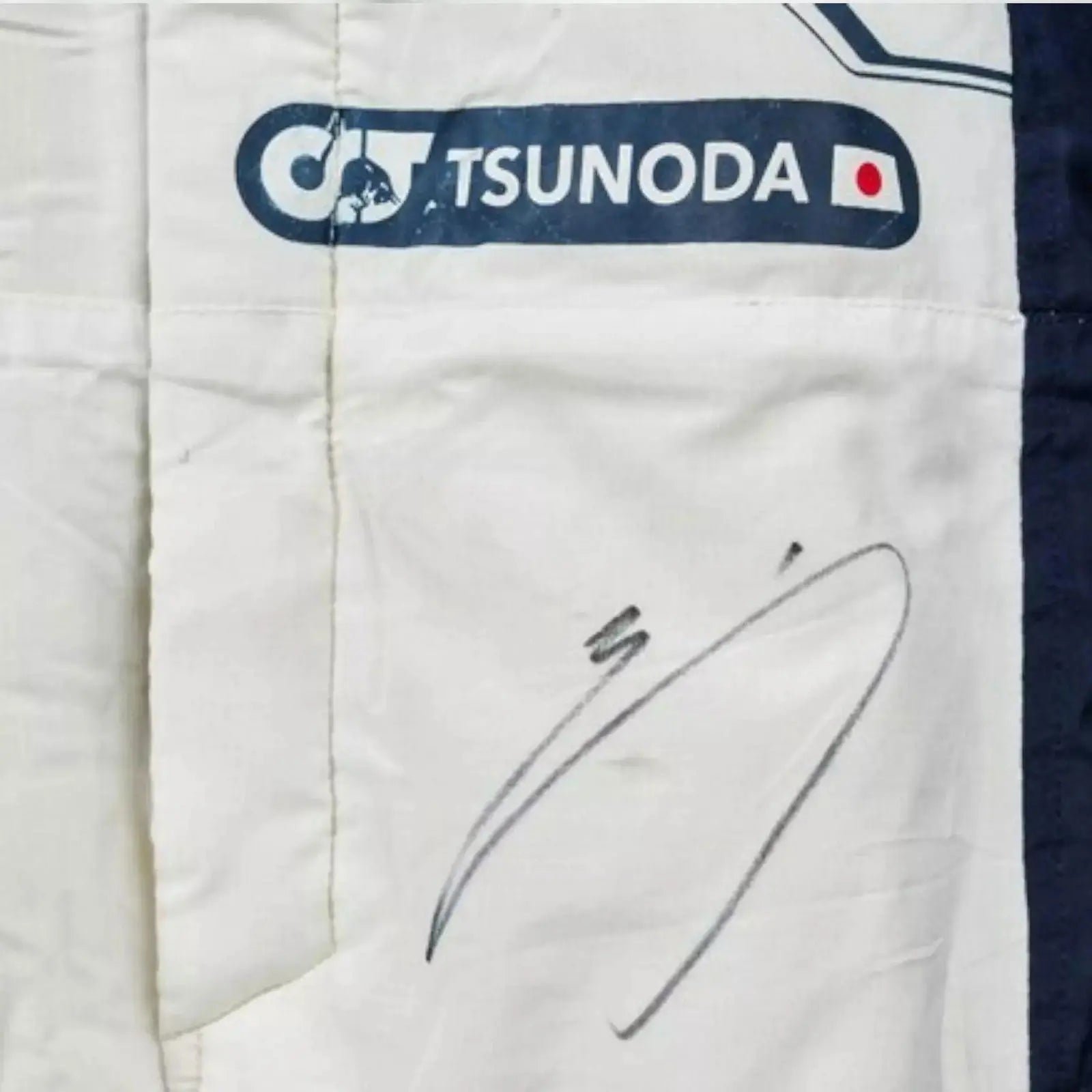 2022_Yuki_Tsunoda_Scuderia_AlphaTauri_F1_Race_Suit_002.jpg